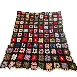 Vintage granny square crocheted afghan